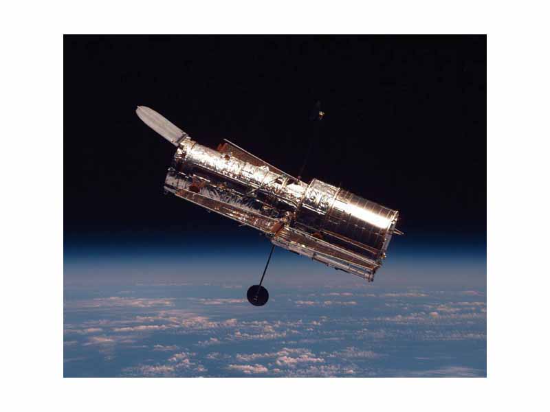 The Hubble Space Telescope orbits above Earth.