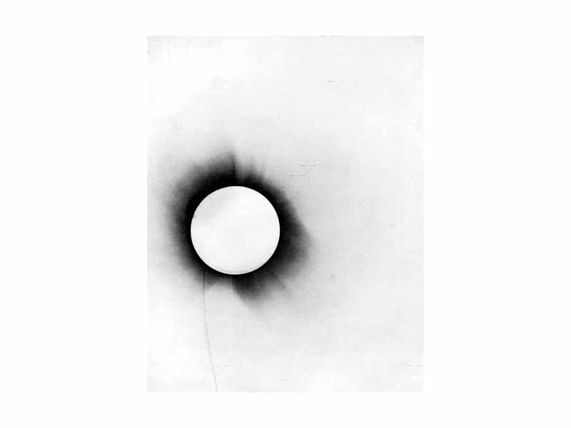 One of Eddington's photographs of the 1919 eclipse, presented in his 1920 paper announcing its success.