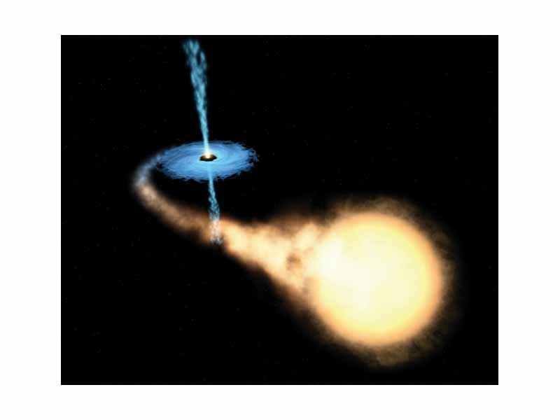Artist's impression of a binary system consisting of a black hole and a main sequence (normal) star. The black hole is drawing matter from the main sequence star via an accretion disk around it, and some of this matter forms a gas jet.